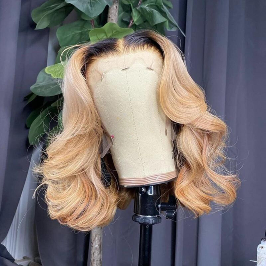 1B/613 blonde ombre bob 13x4 lace frontal wig with body wave texture displayed on mannequin head showing blonde body wave and transparent lace construction