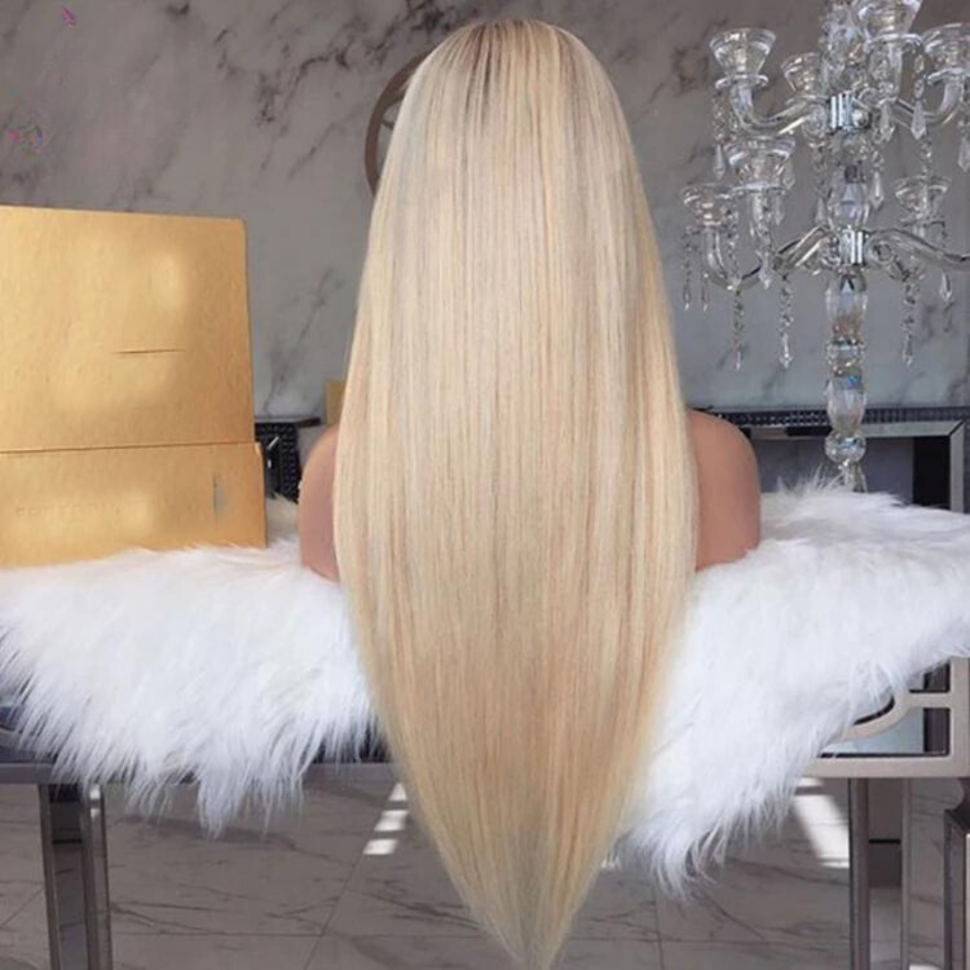 Back view of natural blonde ombre 13x6 transparent lace wig with Peruvian straight hair on mannequin head showing full length and pre-bleached hairline