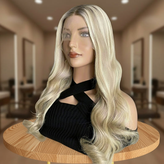 Side view of 18/60 pearl ash blonde natural wave wig showcasing luminous contrast and wave texture