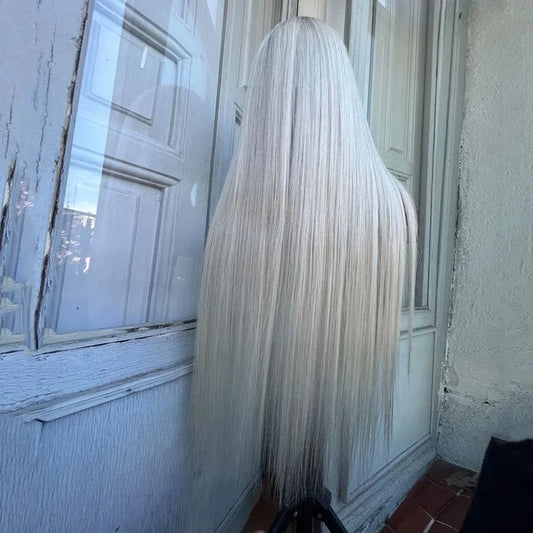 Back view of ash blonde highlight ready-to-wear wig displaying ultra full density and natural movement