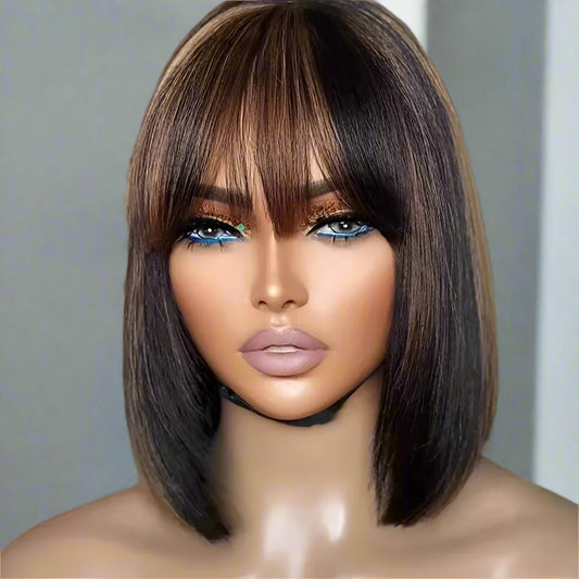 Front view of glueless honey blonde wig displaying stylish bangs and honey blonde highlight placement