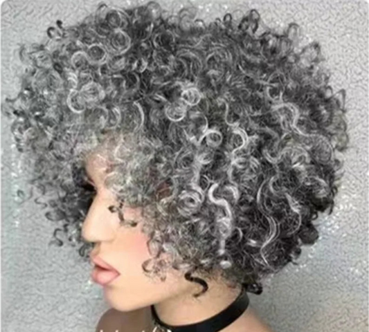 Side view of salt and pepper kinky curly bob wig on mannequin displaying curl pattern and bang style