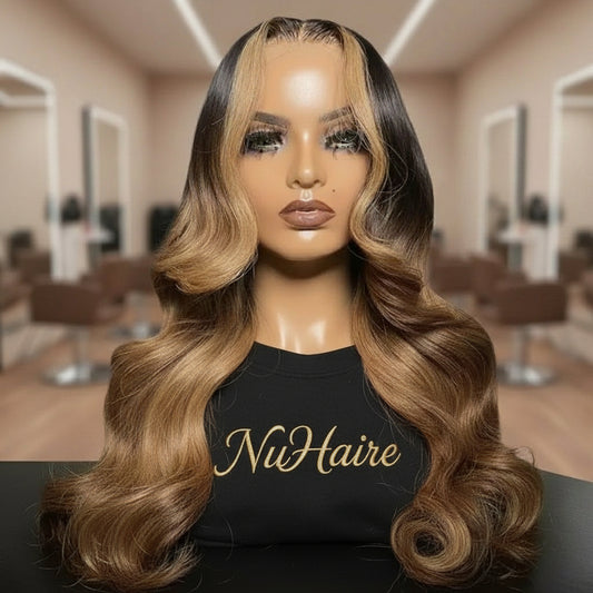 Honey blonde highlight body wave wig displaying face framing color placement and natural texture quality