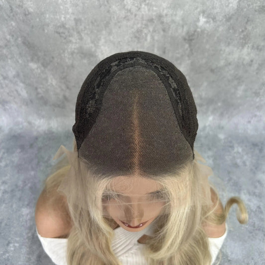 18/60 pearl ash blonde wig cap construction displaying 13x6 transparent lace and hand-tied individual strands
