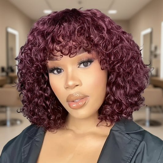 Model wearing NuHaire's 99J Burgundy Curly Wave Bob Wig With Bangs, showcasing burgundy curly waves, premium Human Hair Quality, and glueless installation