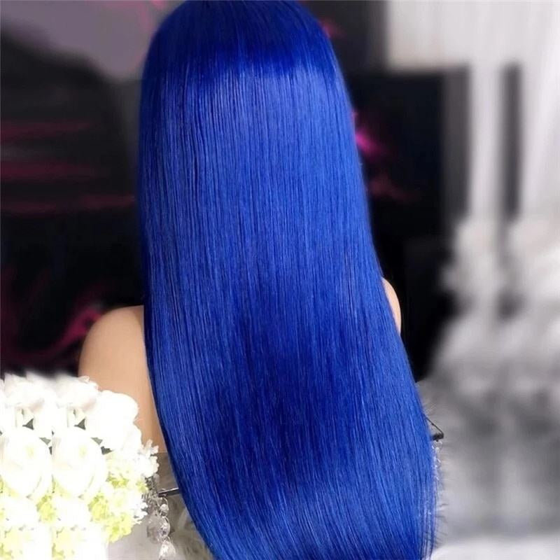 Back view of royal blue straight wig on mannequin in professional salon setting showing full length and color vibrancy