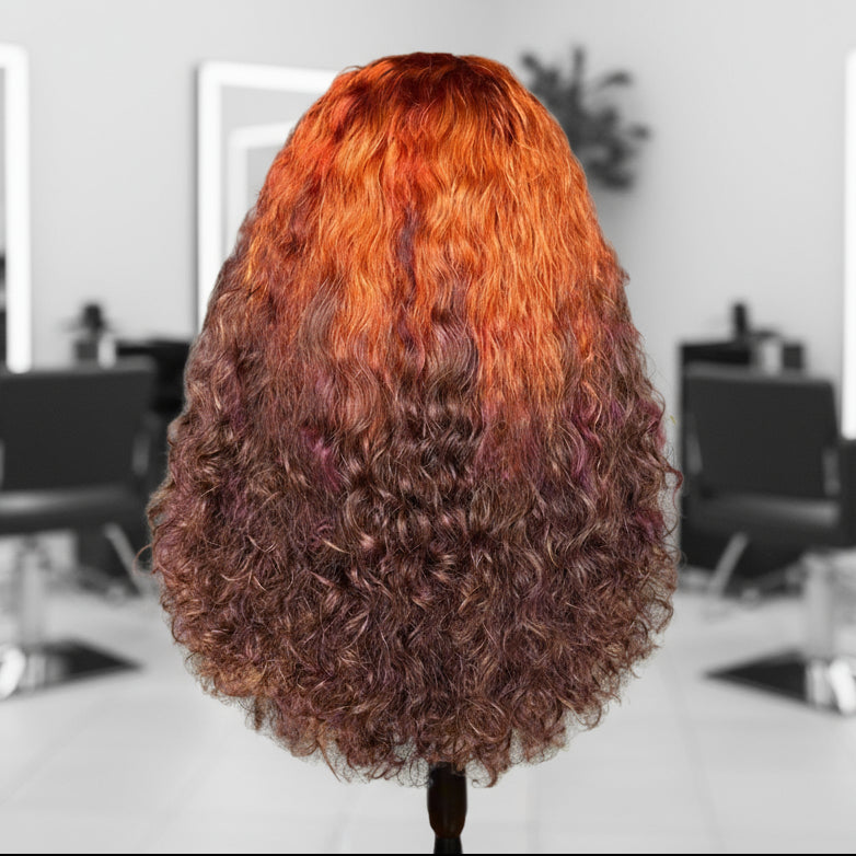 Back view of A mannequin head showcasing NuHaire's 13x4 T-Part Ginger Ombre 4/350 Curly Wave Lace Front Human Hair Wig. The wig features a flawless ombre transition from ginger to brown, made from premium human hair. It includes a transparent lace front, a natural hairline, and beautiful, flowing curly waves.
