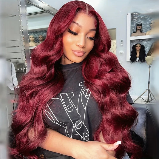 Professional salon installation of 99J burgundy body wave wig showing natural hairline, styling and fit