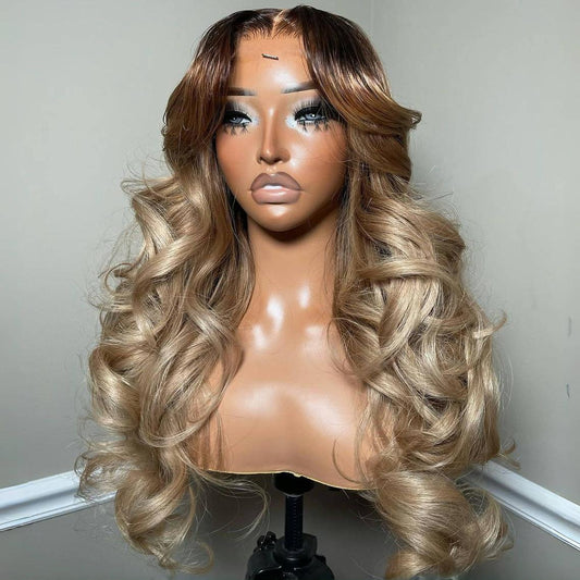 Closer angle of A mannequin displays NuHaire's Rooted Ash Blonde Balayage| 13x4 Body Wave, featuring a dark root that transitions to ash blonde highlights. This high-quality human hair wig offers a full 250% density, body wave texture, 13x4 lace front, and a transparent lace for a natural hairline