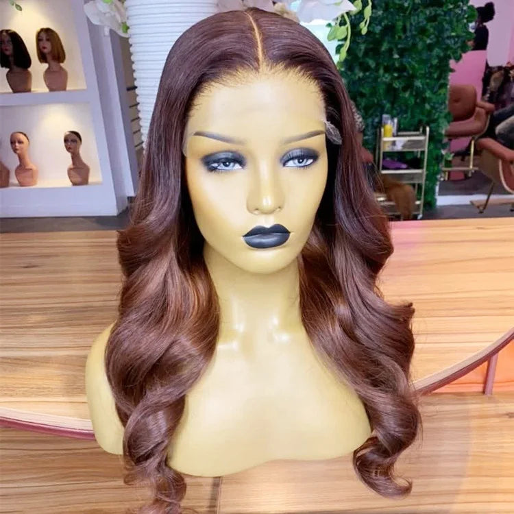 Up close view of 13x4 Transparent lace front auburn highlight human hair body wave wig displayed on mannequin head showing premium natural hairline, styling versatility, and realistic scalp in NuHaire hair salon