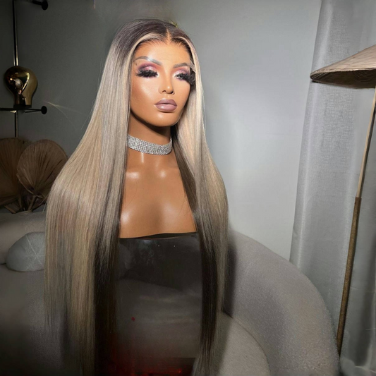 Mannequin head featuring NuHaire's Ash Blonde Ombre Highlight Straight Wig, showcasing a flawless color transformation, premium European human hair quality, 13x4 transparent lace front, natural hairline, and silky straight texture against a neutral setting.