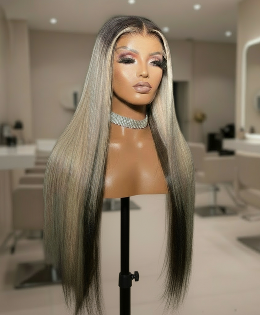 Mannequin head featuring NuHaire's Ash Blonde Ombre Highlight Straight Wig, showcasing a flawless color transformation, premium European human hair quality, 13x4 transparent lace front, natural hairline, and silky straight texture against a neutral setting.