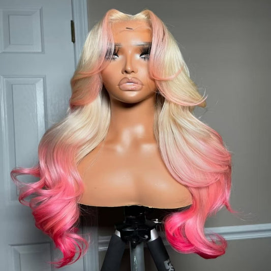Mannequin head featuring NuHaire's 5x5 pink peekaboo highlights on a 613 blonde body wave human hair wig, showcasing a flawless color transformation, premium human hair quality, lace closure hairline, and bouncy body waves against a neutral background.