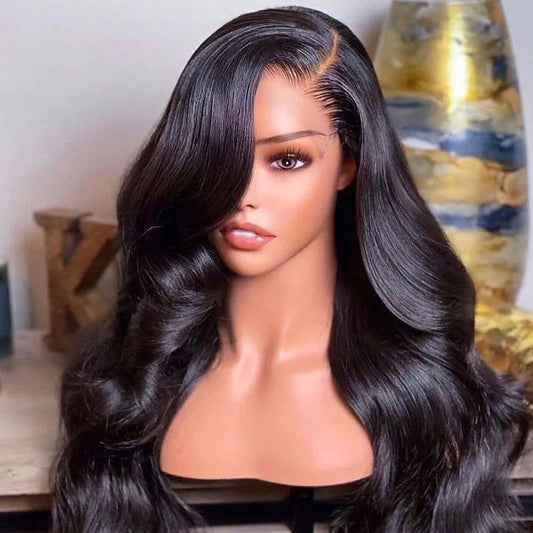 Long 5x5 Transparent lace closure human hair body wave wig displayed on mannequin head showing premium natural hairline, styling versatility, and realistic scalp