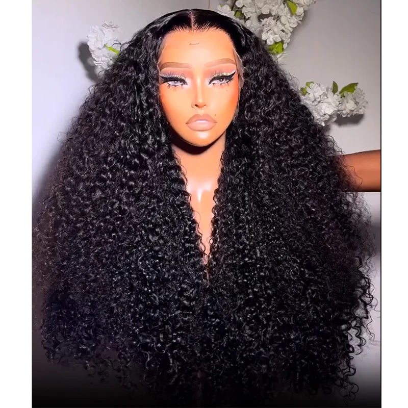 NuHaire Peruvian human hair 13x4 lace front curly wig displayed on a mannequin head, featuring voluminous, bouncy curls that cascade down. The wig is styled, showcasing its rich texture and vibrant sheen under soft lighting. The mannequin is set against a neutral background, highlighting the wig's details.