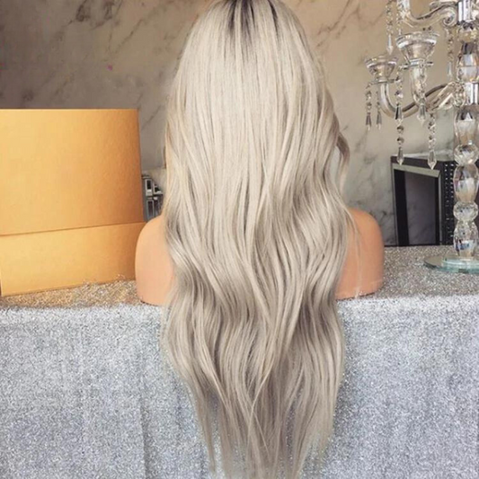 Back view displays a mannequin head showing a NuHaire 13x6 transparent lace front human hair wig, highlighting the ombre ash blonde color, premium European human hair, full volume from root to tip, and beach wave texture.