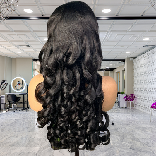 Back view of 13x4 HD lace front Funmi Curl Indian human hair wig displayed on a mannequin head showing full volume, rich natural black color, and funmi curly texture