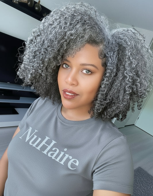 Different angle of Model showcasing NuHaire's Salt & Pepper Kinky Curly Bob | 13x4x1 Transparent Lace Human Hair Wig, featuring a natural black and silver grey hair color, premium human hair, bouncy kinky curly texture, and a 13x4 Transparent Lace Front.