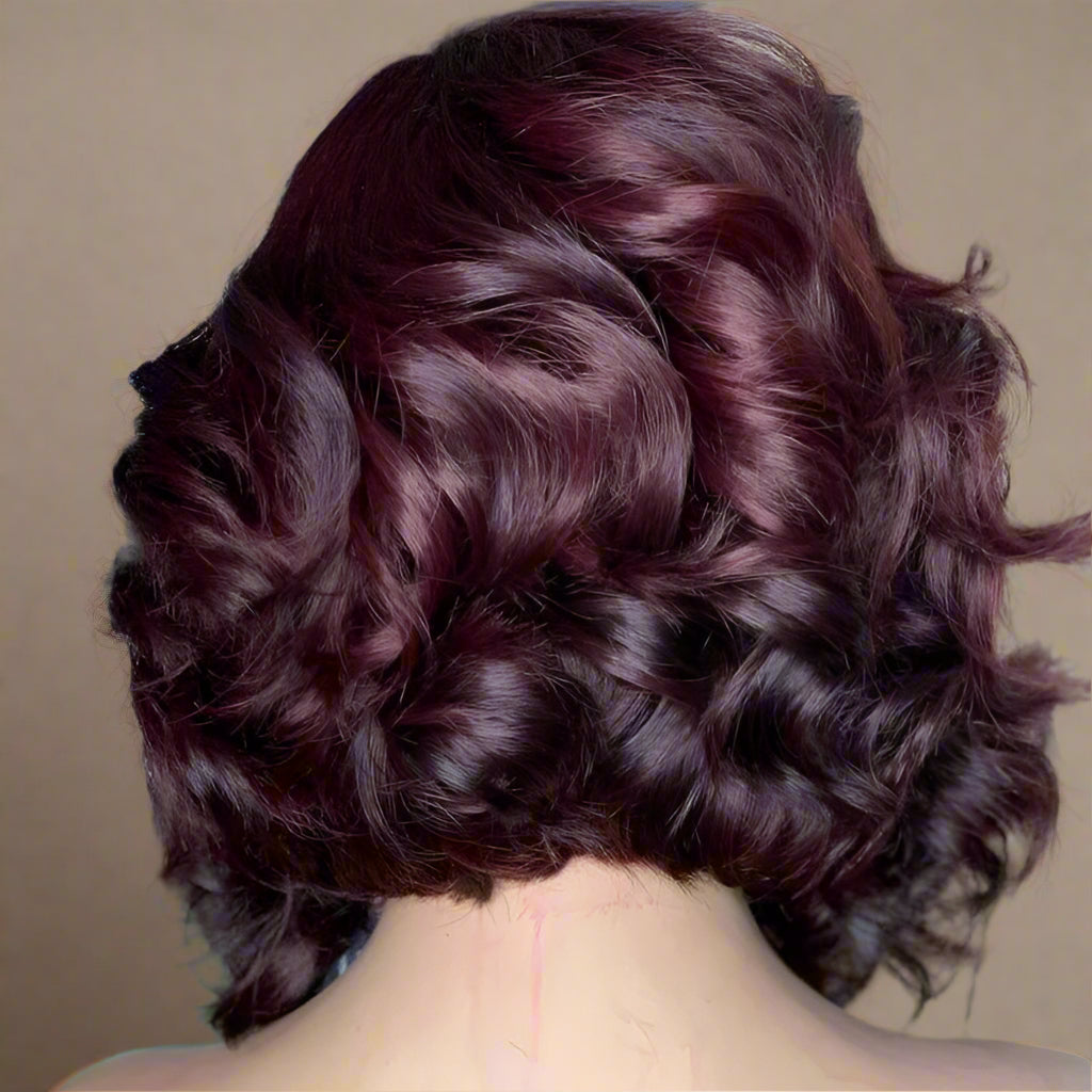 Back view of burgundy 99J layered bob wig displaying full hair density and loose wave texture