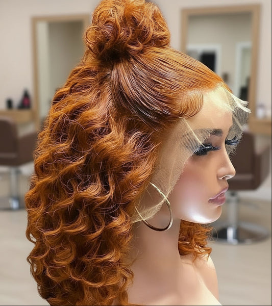 Side view of ginger curly bob wig displaying bouncy curl pattern and bob length