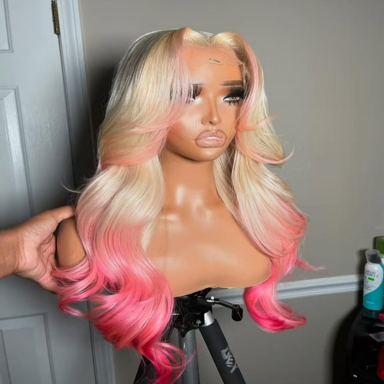 Side angle of Mannequin head featuring NuHaire's 5x5 pink peekaboo highlights on a 613 blonde body wave human hair wig, showcasing a flawless color transformation, premium human hair quality, lace closure hairline, and bouncy body waves against a gray background.