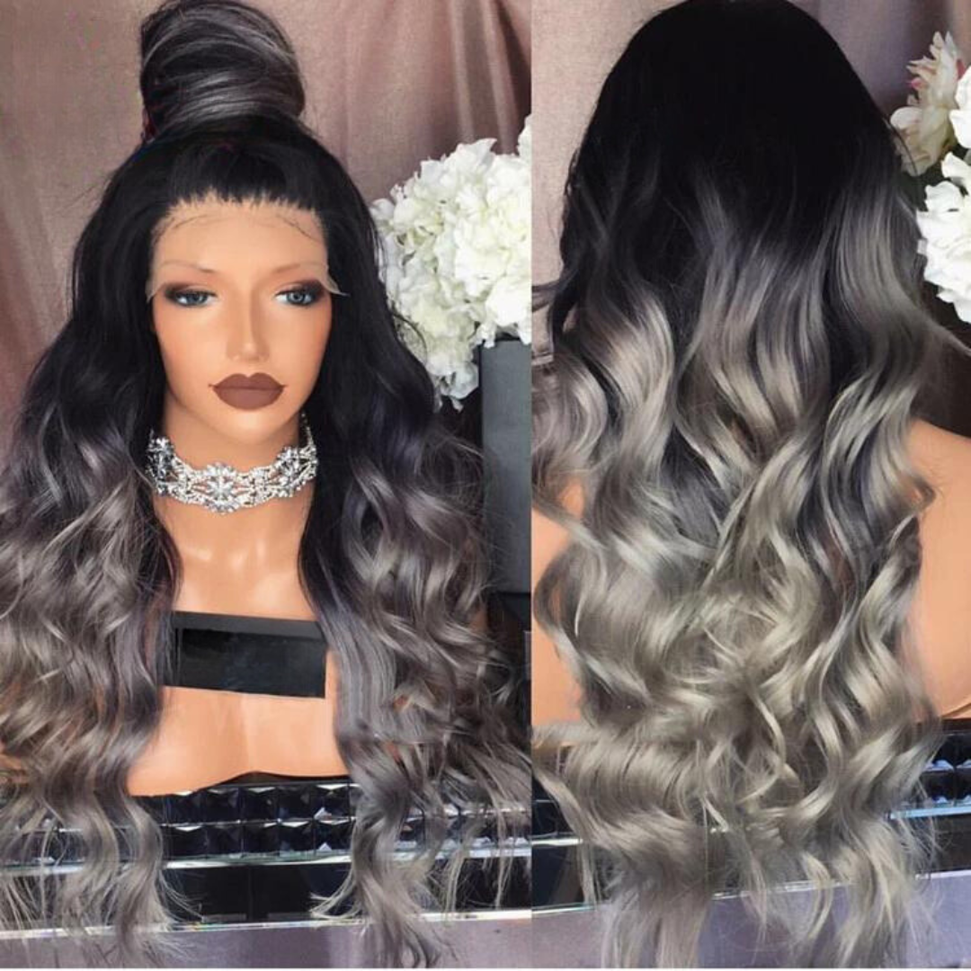 A mannequin head display of NuHaire's High Density Grey Ombre Human Hair Wig, showcasing a flawless silver grey ombre color transition, premium human hair quality, 13x4 lace front, natural hairline, styling versatility, and flowing loose wave texture.