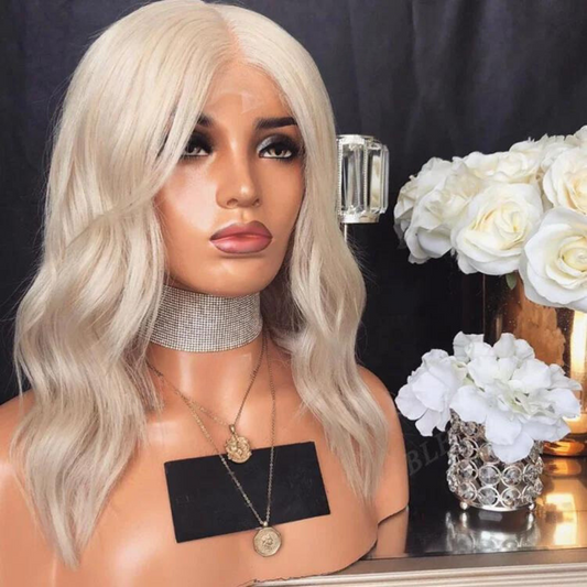 Platinum blonde 13x6 transparent lace loose wave bob wig displayed on mannequin in natural state facing slightly left showing luminous blonde and HD lace construction