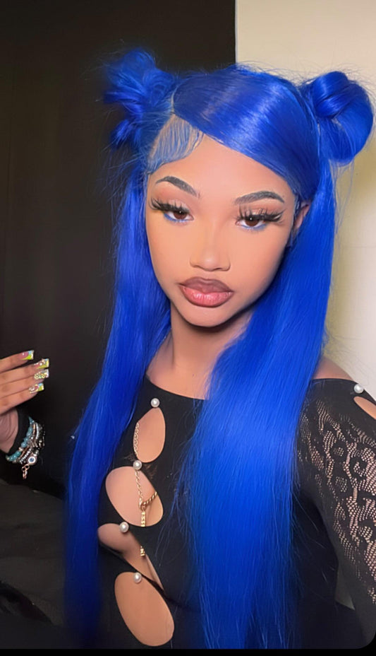 A vibrant blue body wave lace front wig styled in a straight hairstyle