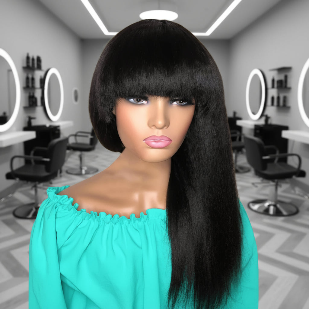 Side view of a mannequin head showcases a Kinky Straight Easy Install Machine-Made Bob Wig with bangs. It features a natural black color and a luxurious kinky straight texture made from premium human hair.