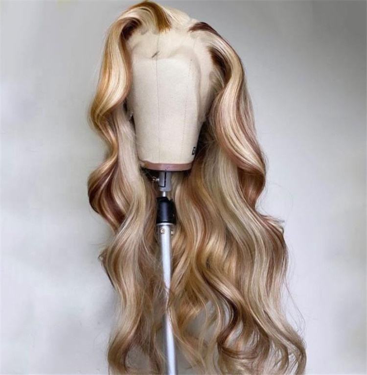 Trio blonde highlight wig showing dimensional color blend and body wave pattern from alternate view