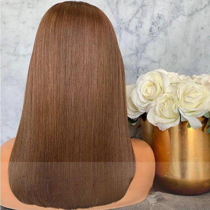 Back view of NuHaire's caramel brown straight 13x4 lace front European human hair bob wig displayed on a mannequin head, with a transparent lace front and a silver-colored necklace.