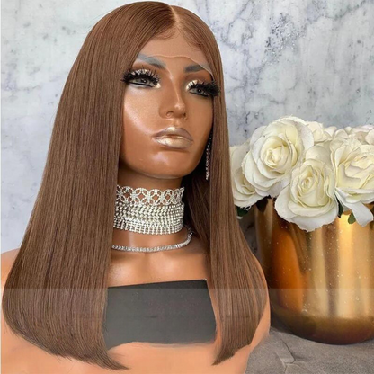 Side angle of NuHaire's caramel brown straight 13x4 lace front European human hair bob wig displayed on a mannequin head, with a transparent lace front and a silver-colored necklace.