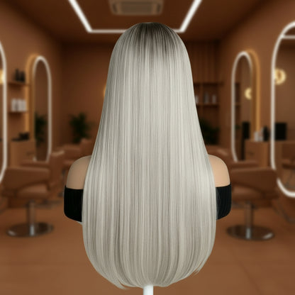 Back view of Mannequin head with long European human hair glueless ash grey blonde wig in a room with shelves and decor.