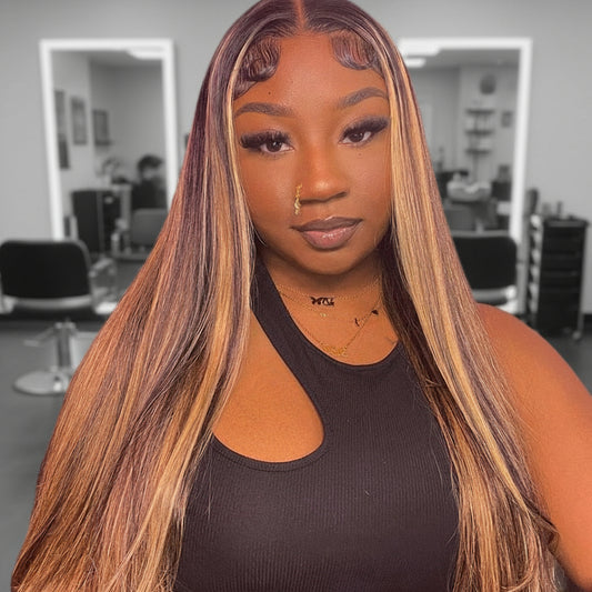 a model wearing NuHaire Straight Honey Blonde Highlight Wig, featuring rich honey blonde highlights and silky straight texture, complete with thin 13x4 transparent lace.