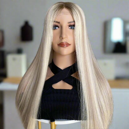 Platinum ash blonde mono lace wig front view showing hand-tied monofilament construction and European human hair