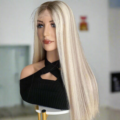 Side view of platinum ash blonde wig showcasing silky straight texture and natural movement
