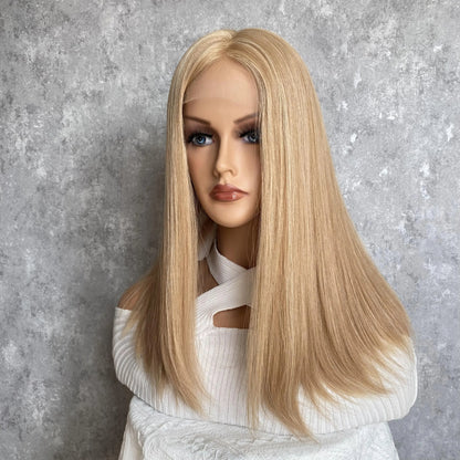 Side view of 8/24 duo tone ash brown wig showing silky straight texture and European hair quality