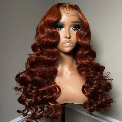 Cinnamon brown loose deep wave wig from side angle showing 26-inch length and natural wave movement