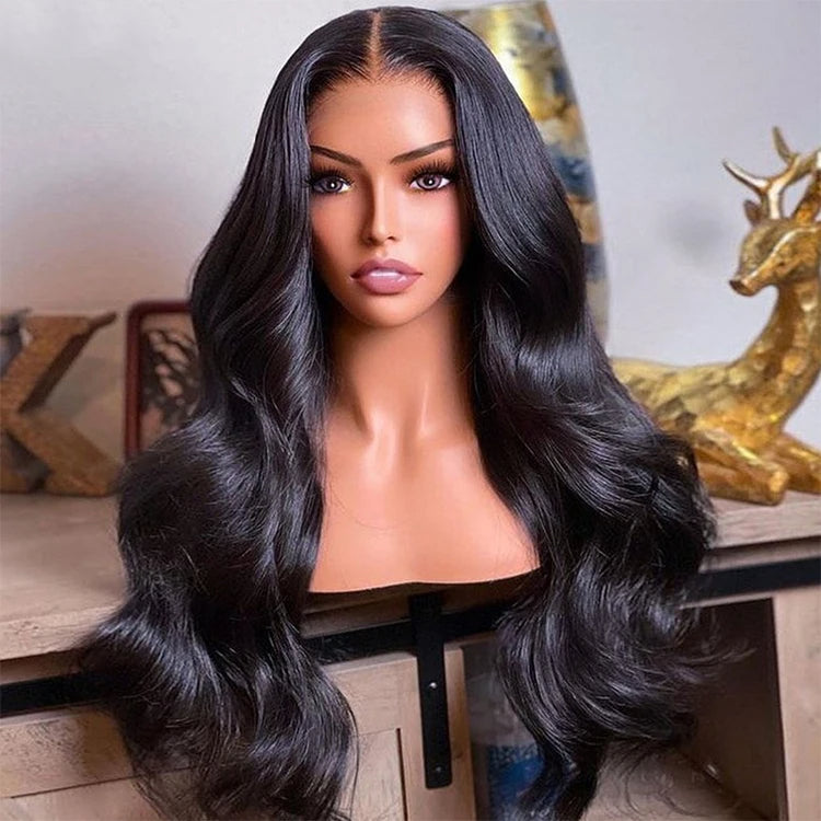 Long 5x5 Transparent lace closure human hair body wave wig displayed on mannequin head showing premium natural hairline, styling versatility, and realistic scalp with decorative background