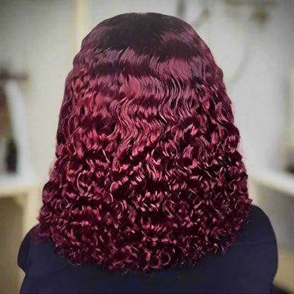 A 1B/99J burgundy ombre curly bob wig on a mannequin head, with close-up back view images showing the wig's texture and color progression from natural black to burgundy.