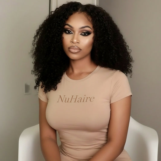 Kinky curly wig showcasing voluminous texture and natural movement on model