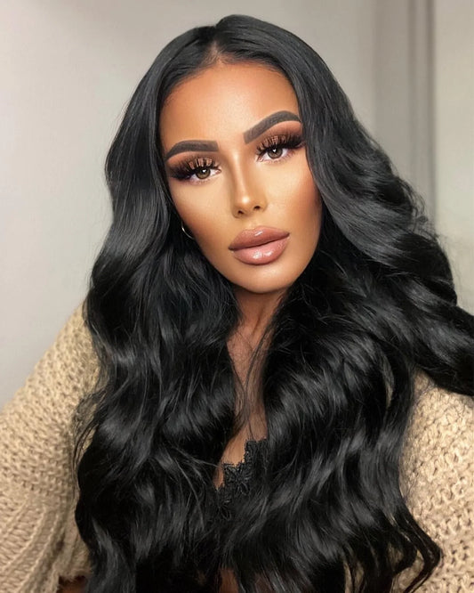 Model wearing a glueless body wave wig with 9x6 M-Cap HD lace closure by NuHaire