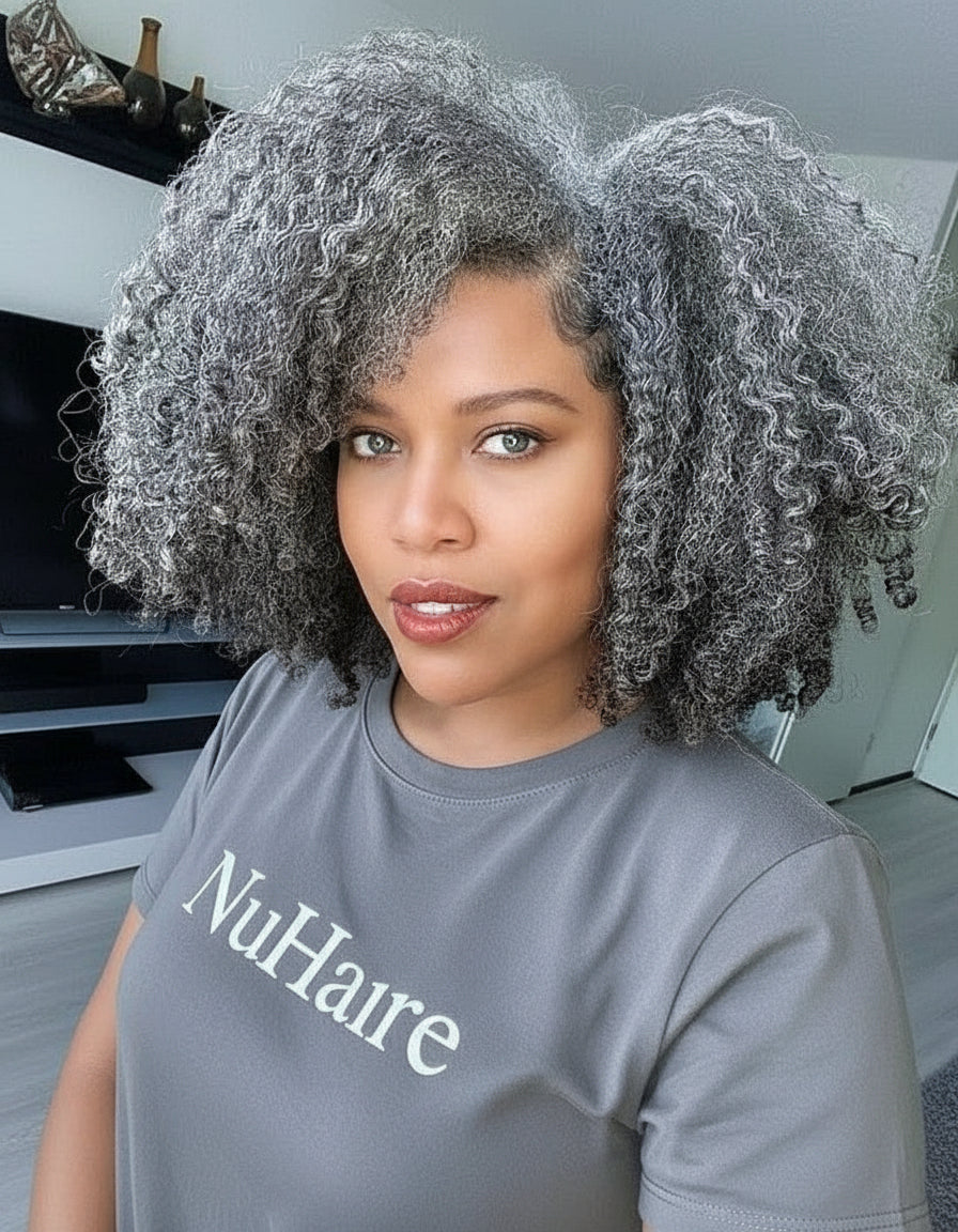 Model showcasing NuHaire's Salt & Pepper Kinky Curly Bob | 13x4x1 Transparent Lace Human Hair Wig, featuring a natural black and silver grey hair color, premium human hair, bouncy kinky curly texture, and a 13x4 Transparent Lace Front.