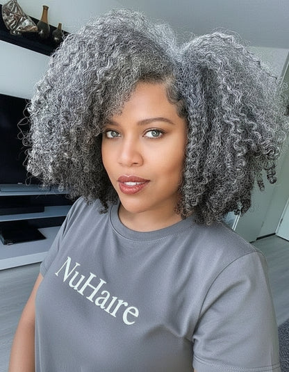 Model showcasing NuHaire's Salt & Pepper Kinky Curly Bob | 13x4x1 Transparent Lace Human Hair Wig, featuring a natural black and silver grey hair color, premium human hair, bouncy kinky curly texture, and a 13x4 Transparent Lace Front.