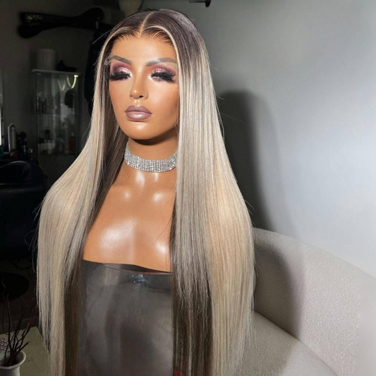 Mannequin head featuring NuHaire's Ash Blonde Ombre Highlight Straight Wig, showcasing a flawless color transformation, premium European human hair quality, 13x4 transparent lace front, natural hairline, and silky straight texture against a gray background.