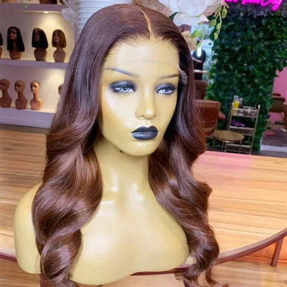 Side angle of 13x4 Transparent lace front auburn highlight human hair body wave wig displayed on mannequin head showing premium natural hairline, styling versatility, and realistic scalp in NuHaire hair salon