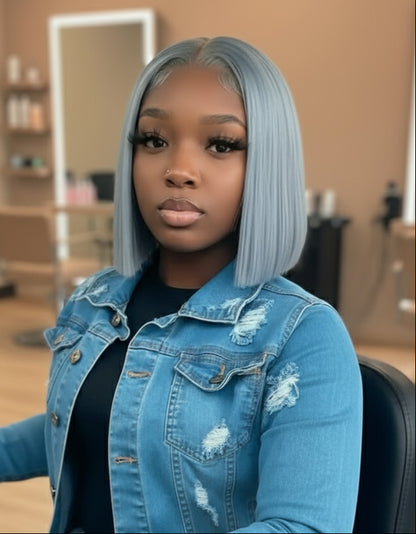 Model wearing the NuHaire High 250 Density Silver Grey Straight Lace Front Double Drawn Bob Wig, featuring a silver grey color, premium human hair quality, a transparent lace front, and a natural hairline.