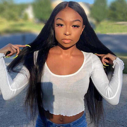 13x4 HD lace front Peruvian straight human hair wig displayed on a model showing full 200% density, rich natural black color, Peruvian Straight texture, premium natural hairline, and realistic scalp in the park