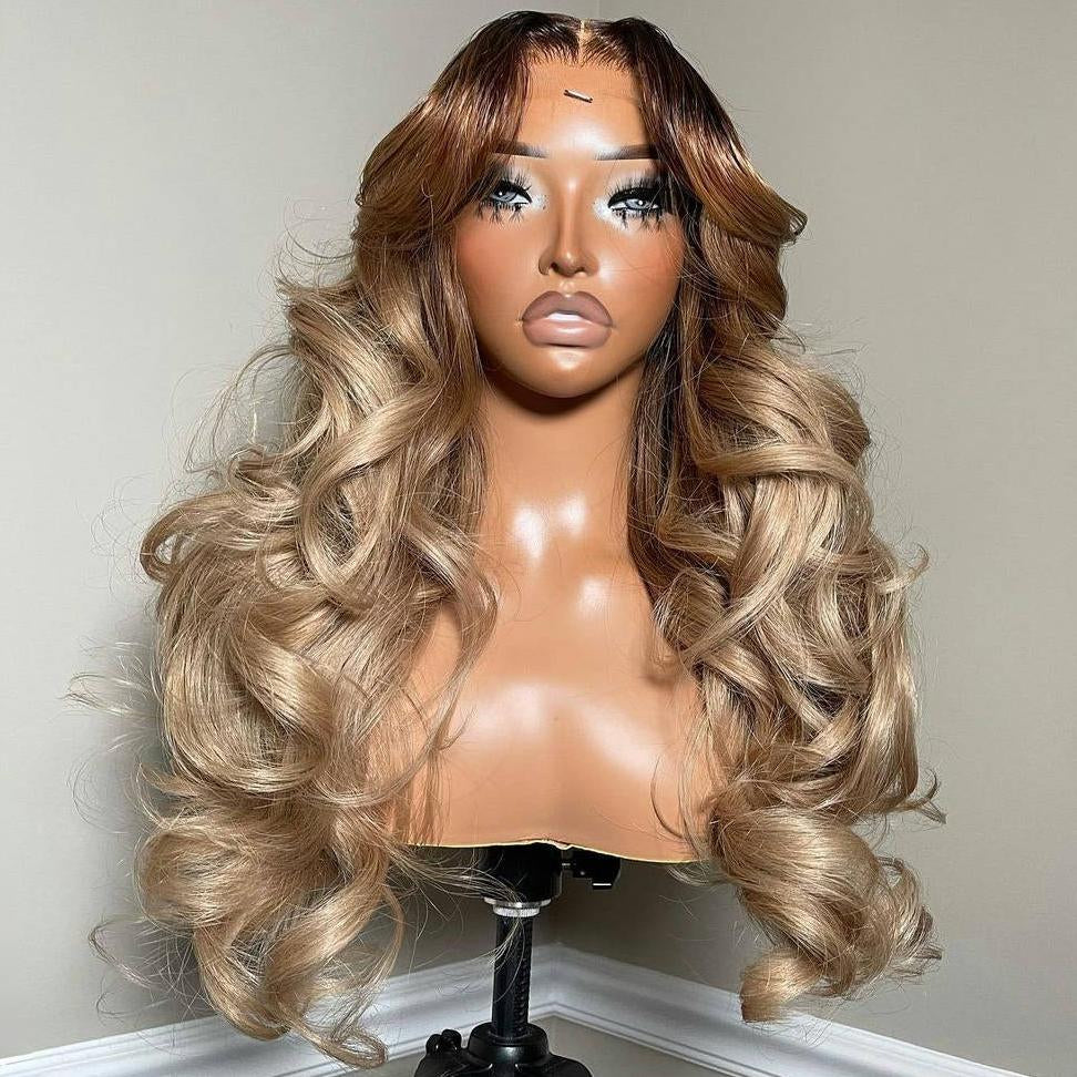 Different Angle of A mannequin displays NuHaire's Rooted Ash Blonde Balayage| 13x4 Body Wave, featuring a dark root that transitions to ash blonde highlights. This high-quality human hair wig offers a full 250% density, body wave texture, 13x4 lace front, and a transparent lace for a natural hairline