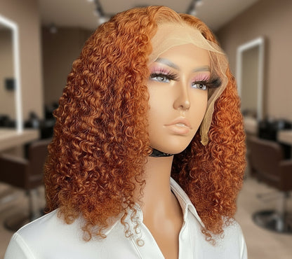 Mannequin head displalying NuHaire's Ginger Curly Bob, showcasing a flawless ginger #350 hair color, premium human hair quality, 13x4 lace front, natural hairline, and bouncy curly texture.